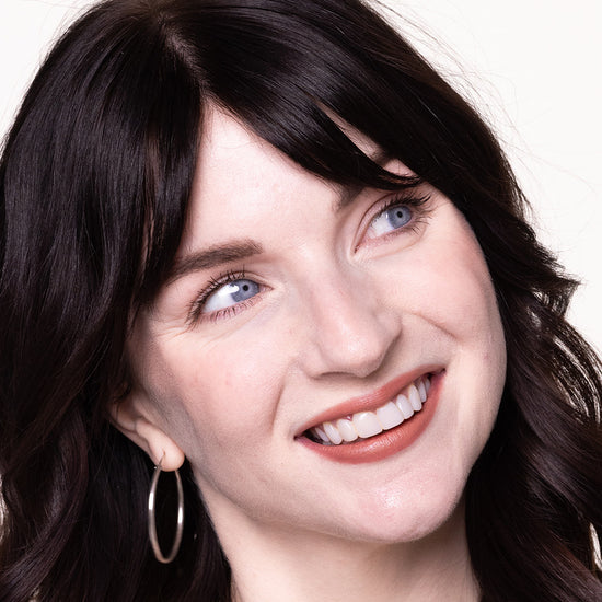 Pale with a rosy undertone